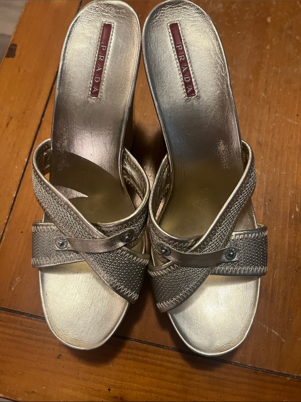 Prada Metallic Gold Crisscross Bottom is cracked